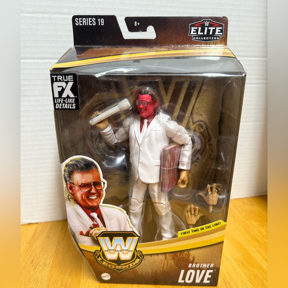 WWE Elite Series 19 Brother Love Action Figure with Red and White Outfit